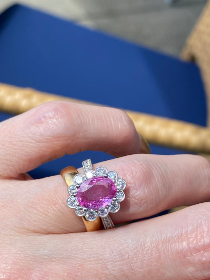 2.02 Carat Oval Cut Pink Sapphire and 0.90 CTW Natural Diamond Halo Ring in Platinum