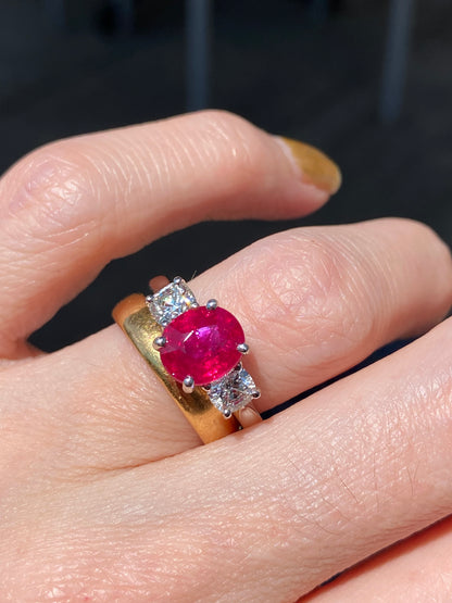 2.41 Carat Oval Ruby and Natural Diamond Three-Stone Engagement Ring in Platinum