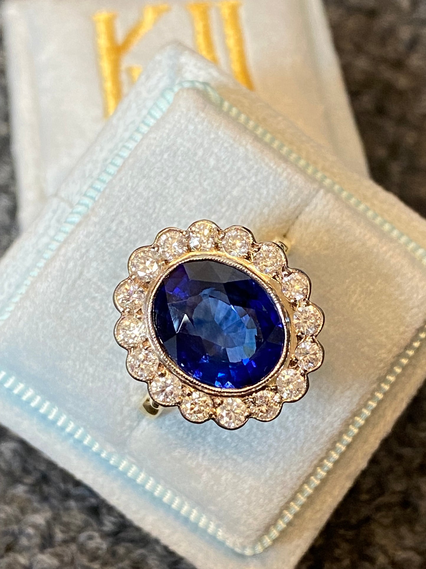 5.35 Carat Blue Ceylon Sapphire and Diamond Halo Ring in 18ct Gold