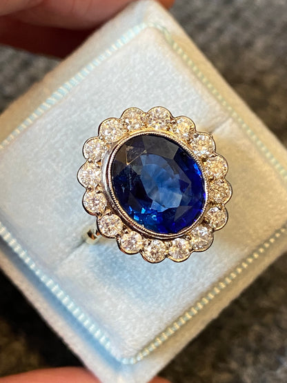 5.35 Carat Blue Ceylon Sapphire and Diamond Halo Ring in 18ct Gold