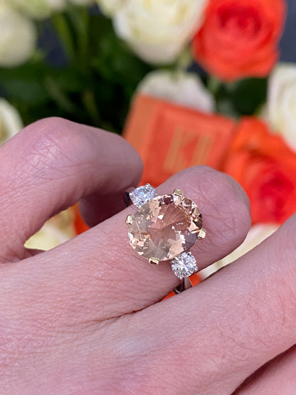 3.11ct Oval Cut Morganite and Diamond Three Stone Engagement Ring in 18ct Gold