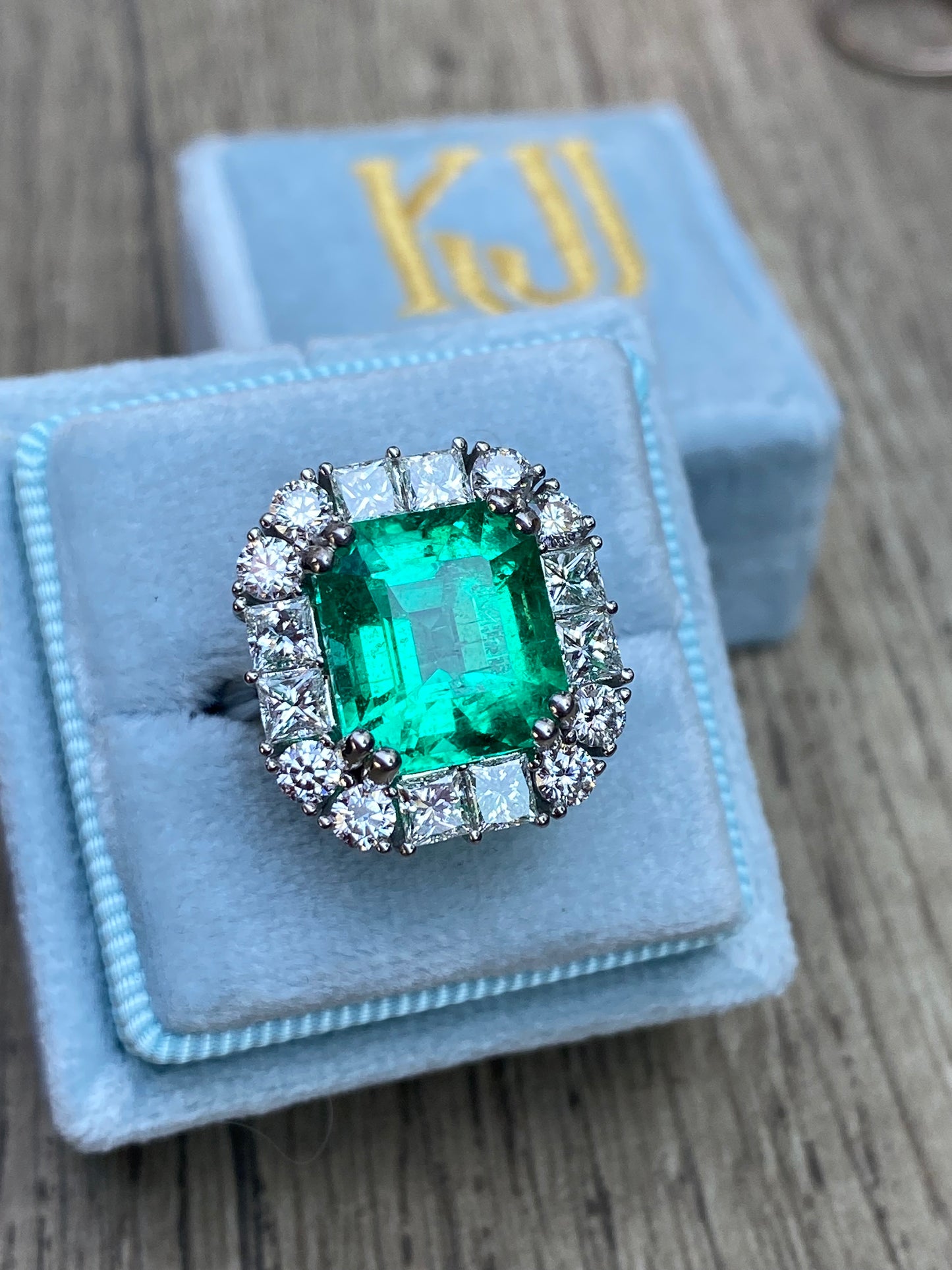 5.92 Carat Emerald Cut Colombian Emerald and Diamond Halo Ring in Platinum