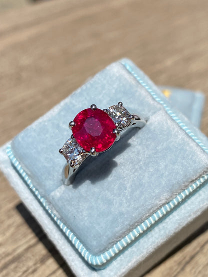 2.41 Carat Oval Ruby and Natural Diamond Three-Stone Engagement Ring in Platinum