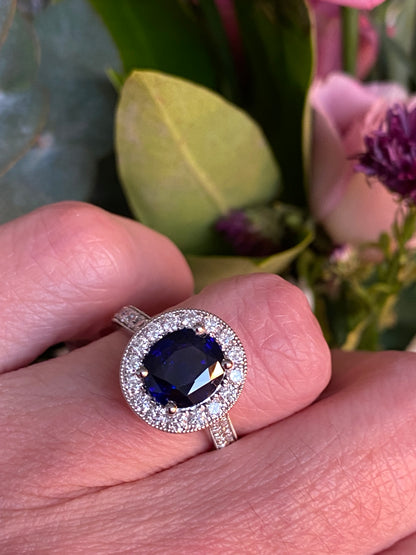 2.10 Carat Blue Ceylon Sapphire and 0.77ctw Natural Diamond Halo Ring in Platinum