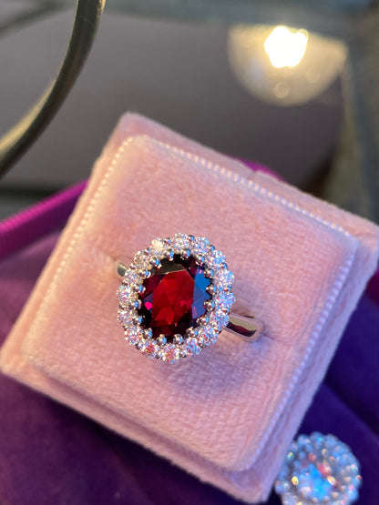 2.33 CTW Oval Cut Garnet and Moissanite Halo Cocktail Ring