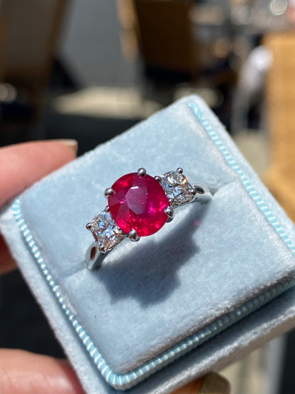 2.41 Carat Oval Ruby and Natural Diamond Three-Stone Engagement Ring in Platinum