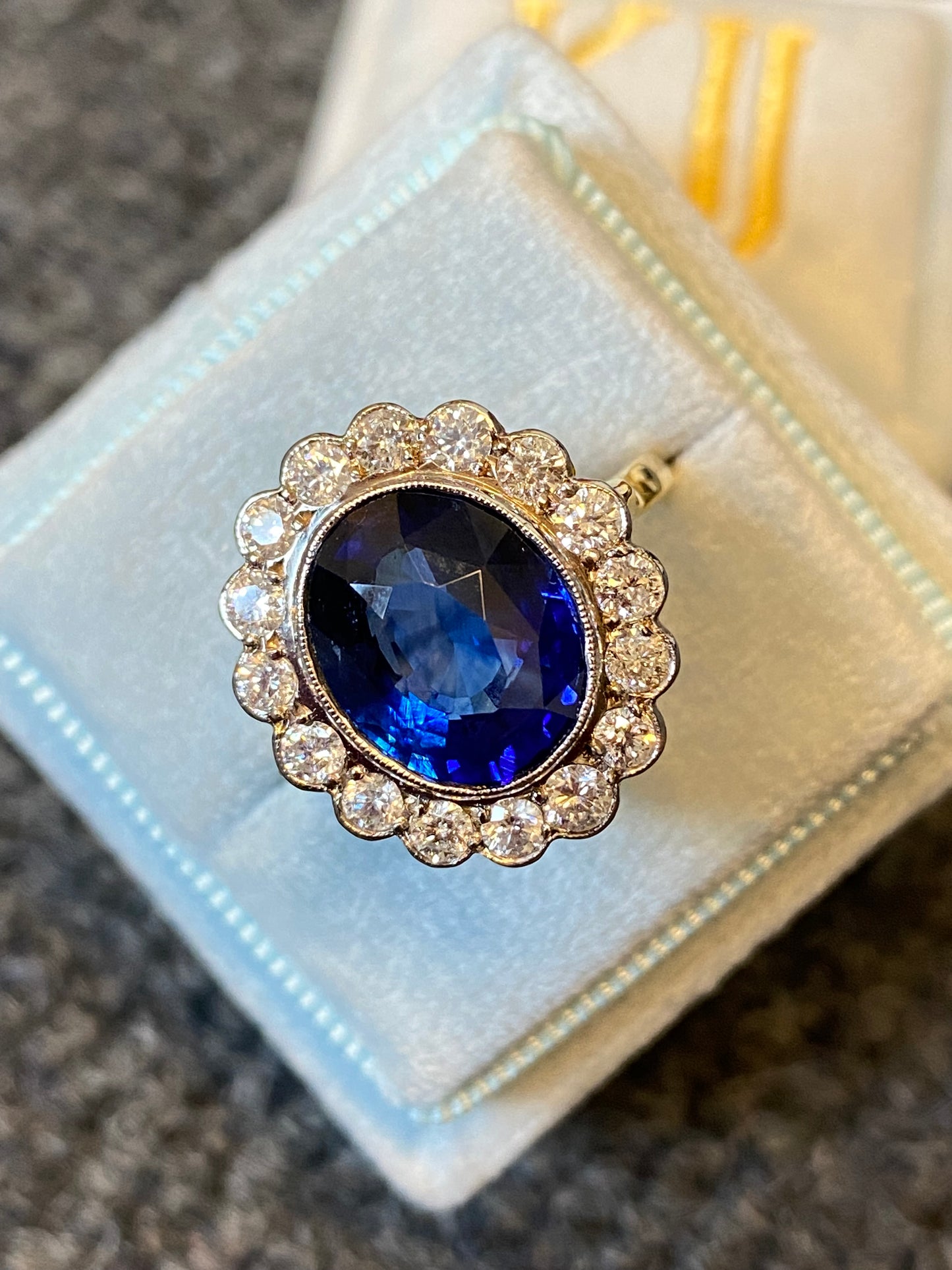 5.35 Carat Blue Ceylon Sapphire and Diamond Halo Ring in 18ct Gold