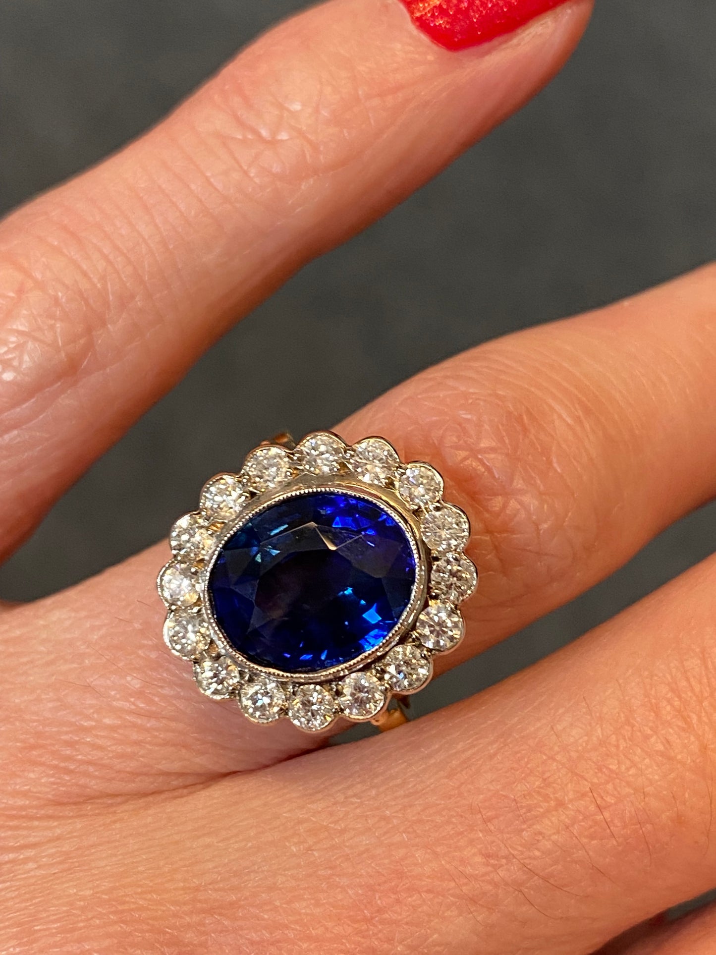 5.35 Carat Blue Ceylon Sapphire and Diamond Halo Ring in 18ct Gold