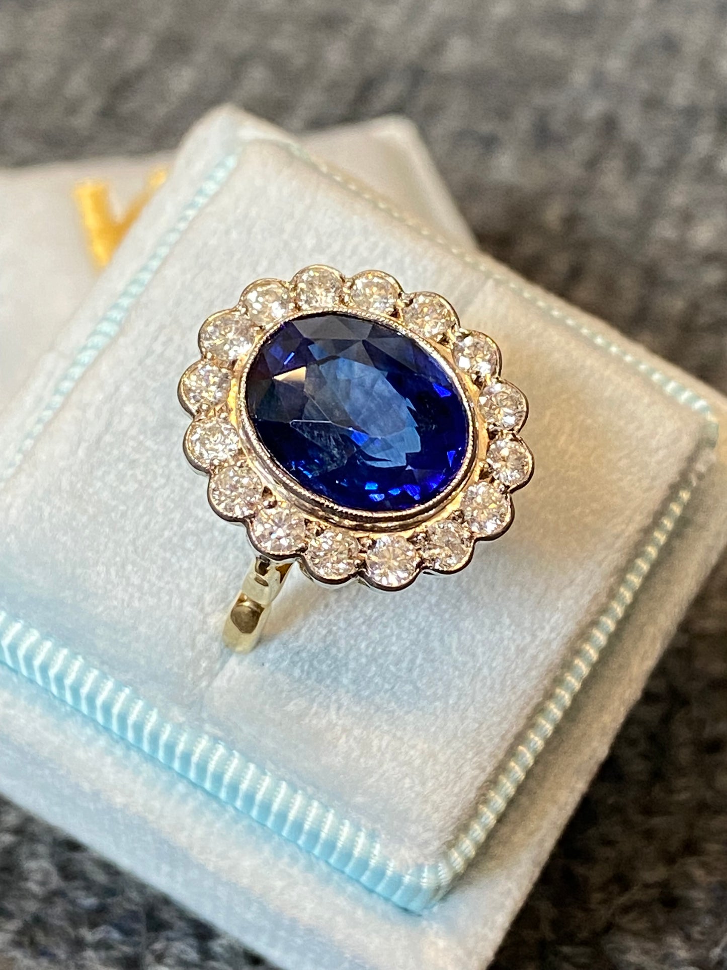 5.35 Carat Blue Ceylon Sapphire and Diamond Halo Ring in 18ct Gold