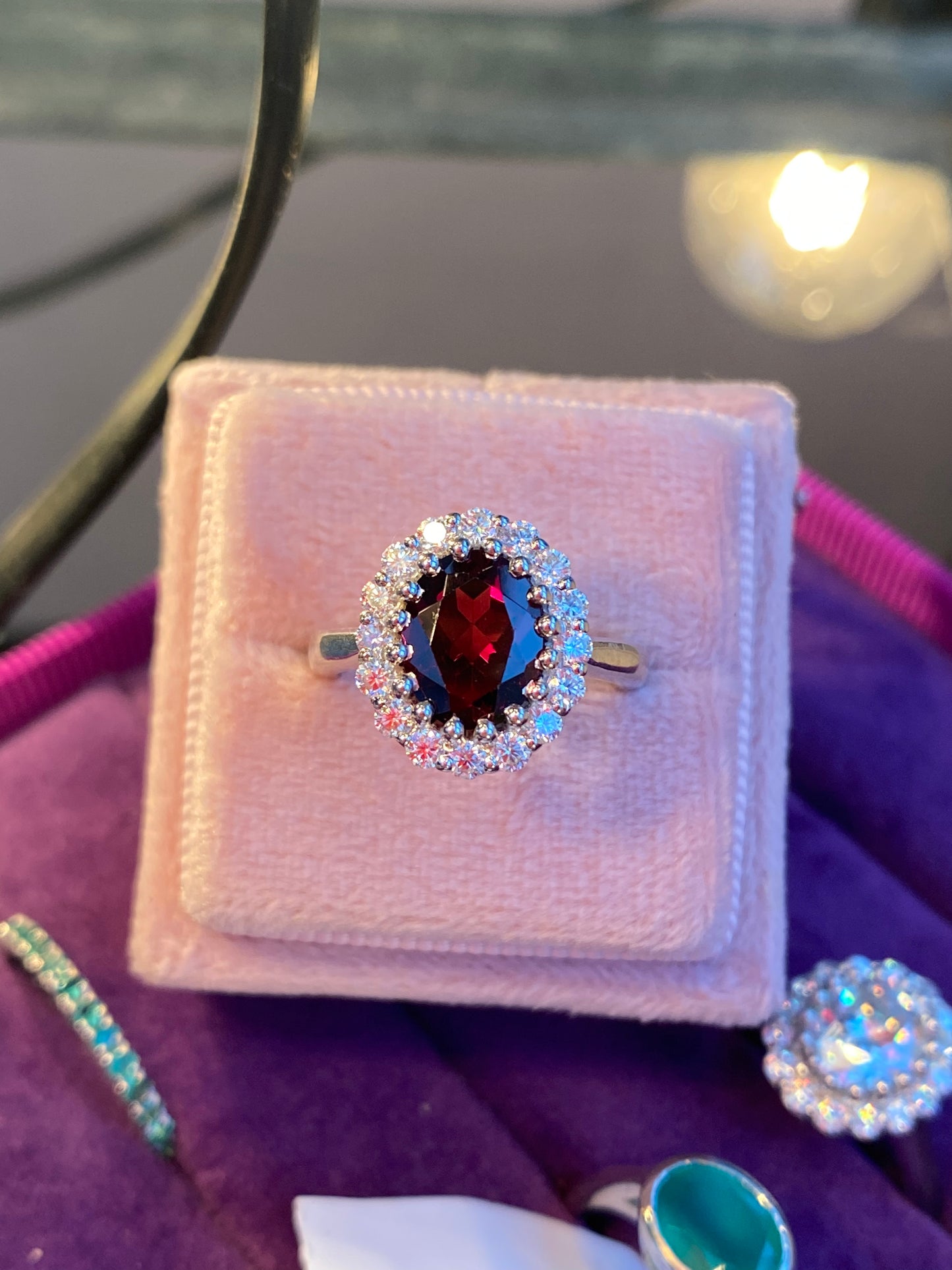 2.33 CTW Oval Cut Garnet and Moissanite Halo Cocktail Ring