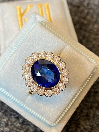 5.35 Carat Blue Ceylon Sapphire and Diamond Halo Ring in 18ct Gold