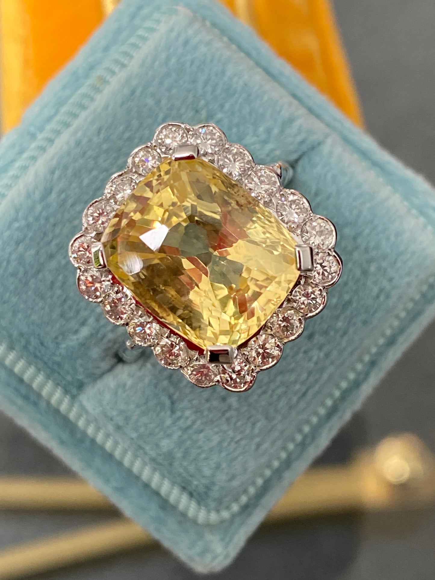 11.32 Carat Certified Unheated Yellow Sapphire and 1.05 Carat Diamond Ring