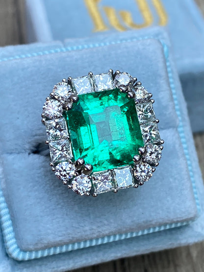 5.92 Carat Emerald Cut Colombian Emerald and Diamond Halo Ring in Platinum