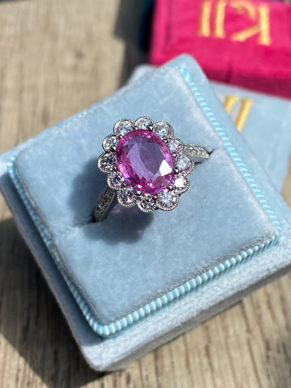 2.02 Carat Oval Cut Pink Sapphire and 0.90 CTW Natural Diamond Halo Ring in Platinum