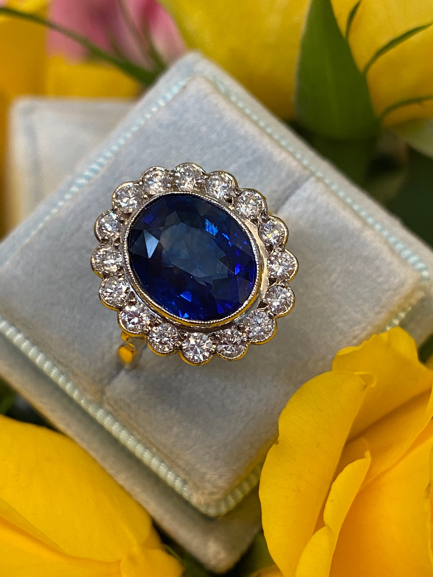 5.35 Carat Blue Ceylon Sapphire and Diamond Halo Ring in 18ct Gold