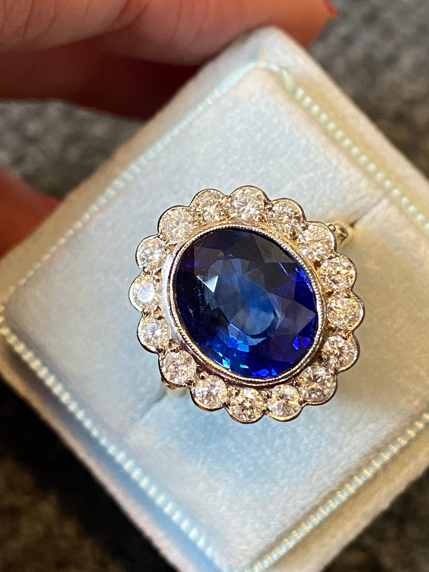 5.35 Carat Blue Ceylon Sapphire and Diamond Halo Ring in 18ct Gold