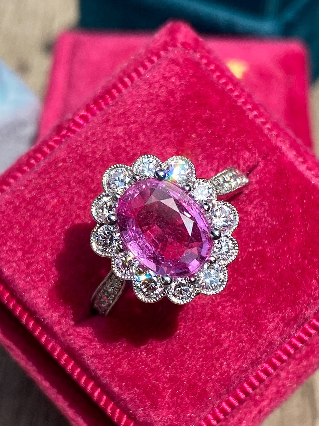 2.02 Carat Oval Cut Pink Sapphire and 0.90 CTW Natural Diamond Halo Ring in Platinum