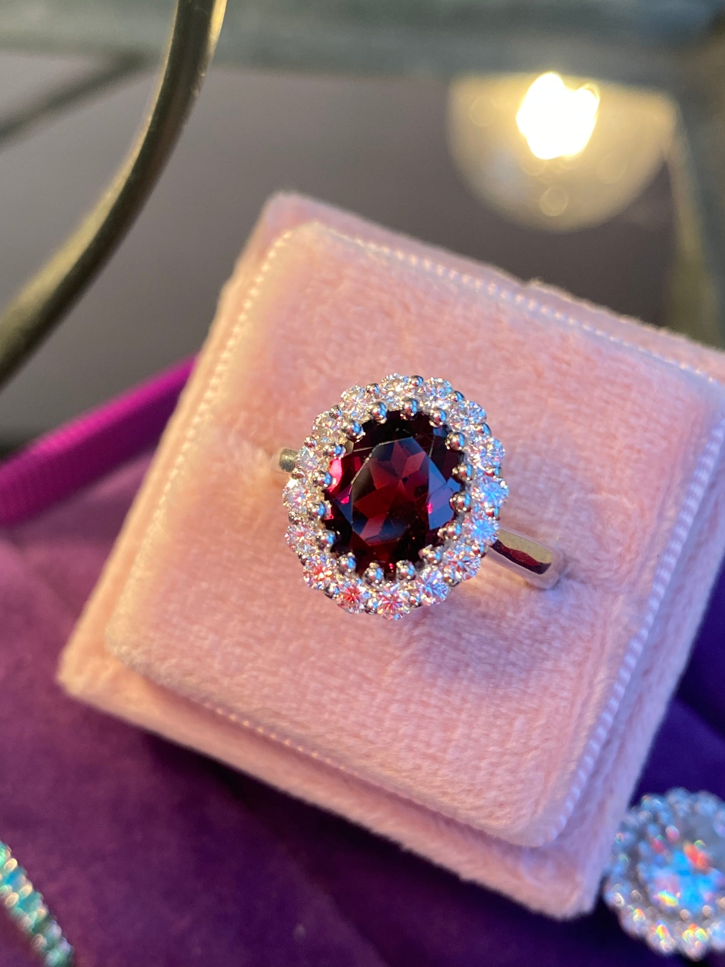 2.33 CTW Oval Cut Garnet and Moissanite Halo Cocktail Ring