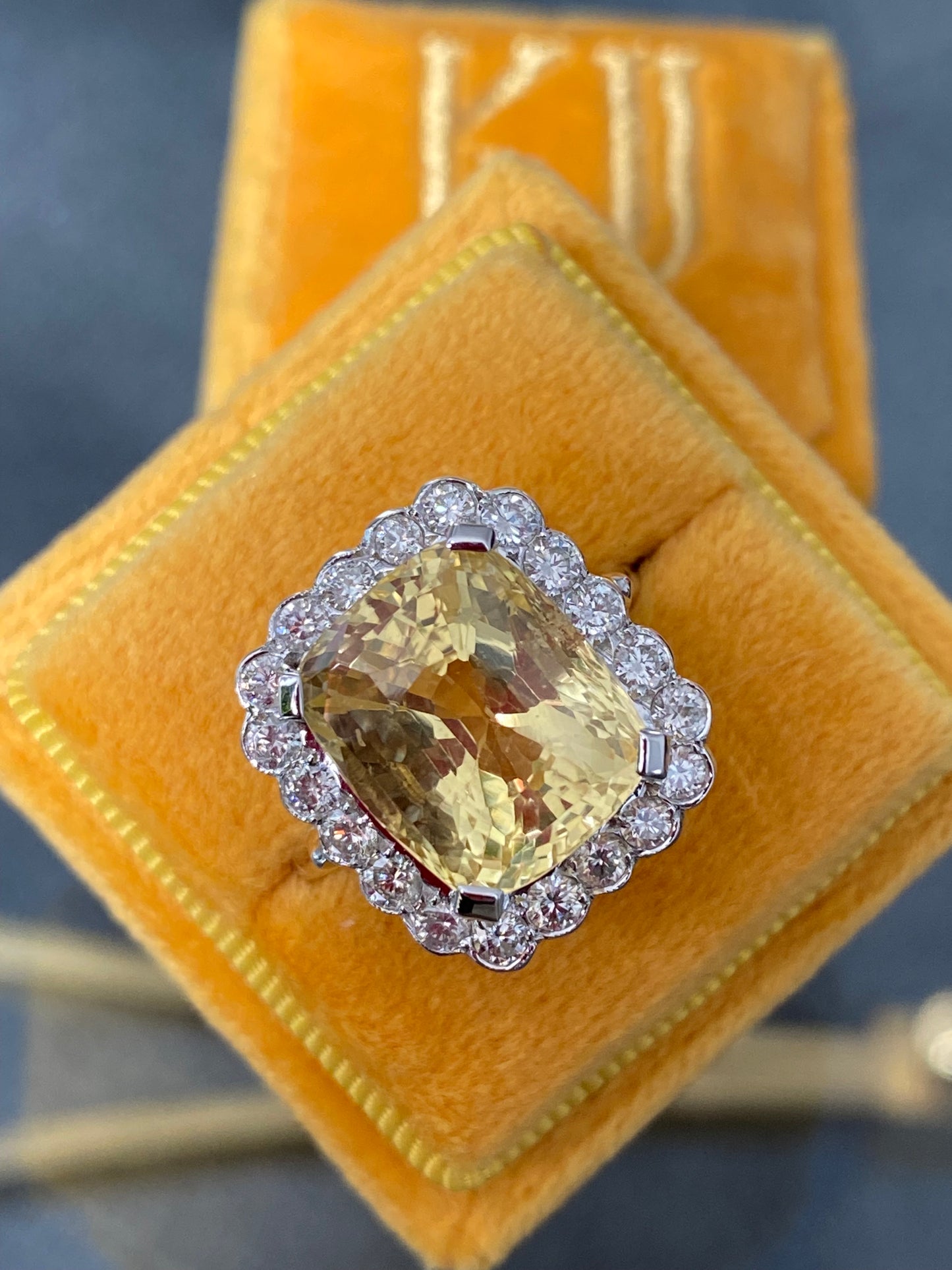 11.32 Carat Certified Unheated Yellow Sapphire and 1.05 Carat Diamond Ring