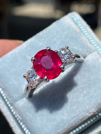 2.41 Carat Oval Ruby and Natural Diamond Three-Stone Engagement Ring in Platinum