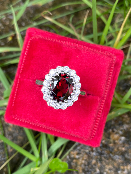 2.33 CTW Oval Cut Garnet and Moissanite Halo Cocktail Ring