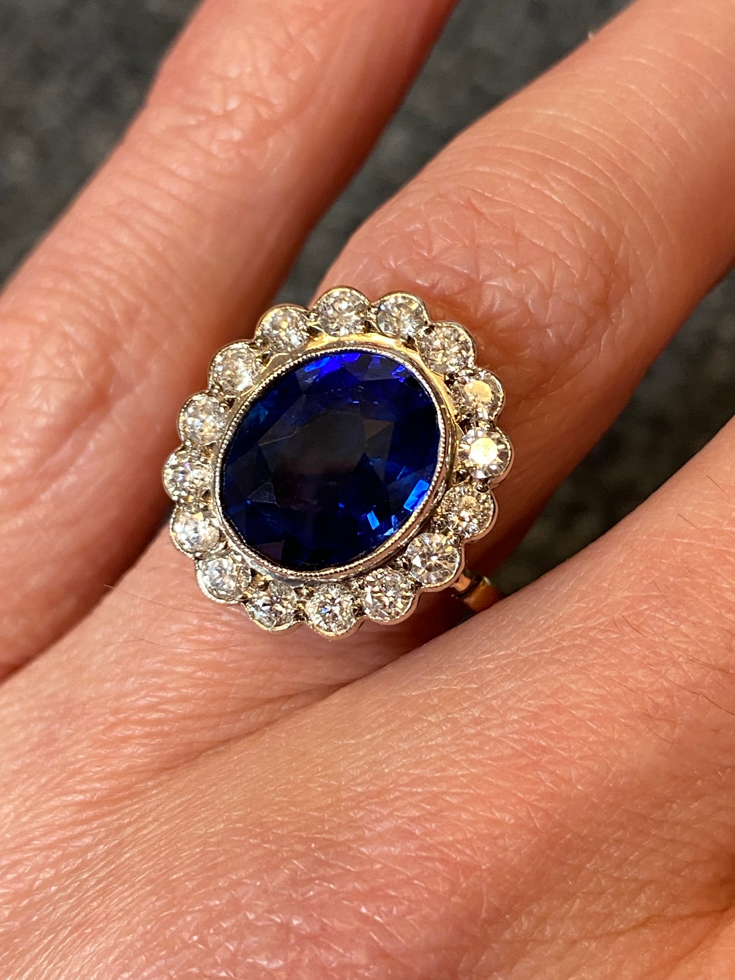 5.35 Carat Blue Ceylon Sapphire and Diamond Halo Ring in 18ct Gold