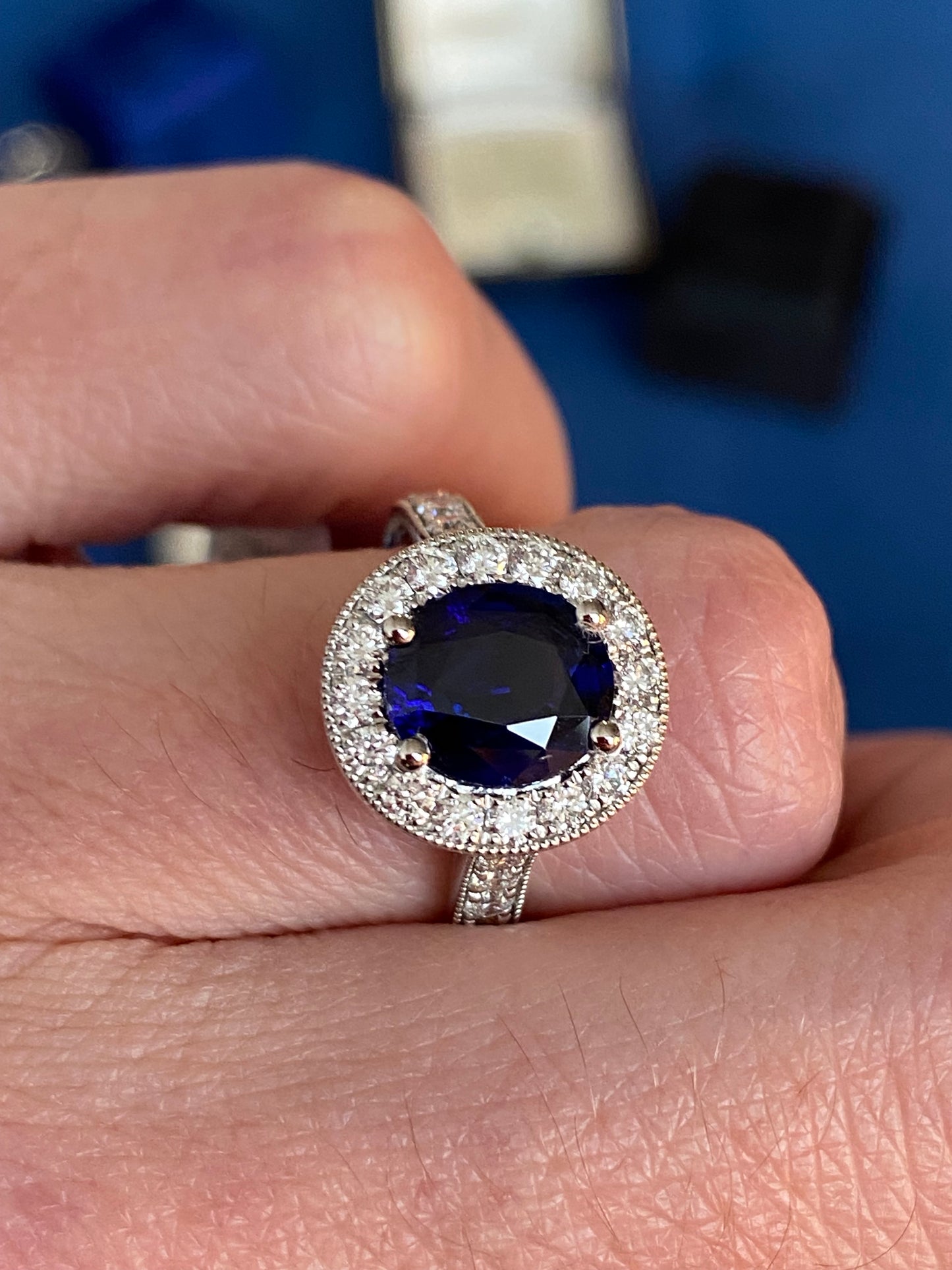 2.10 Carat Blue Ceylon Sapphire and 0.77ctw Natural Diamond Halo Ring in Platinum