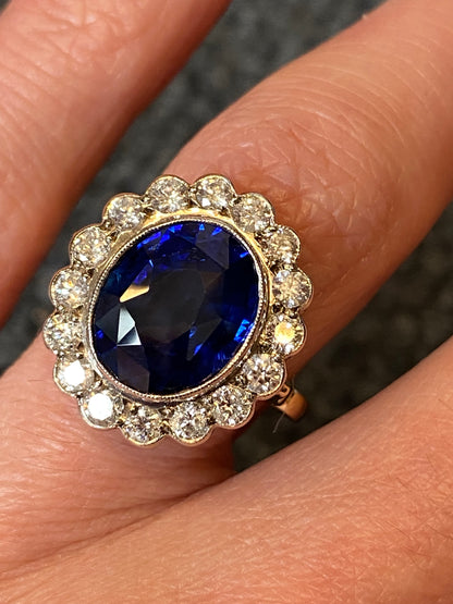 5.35 Carat Blue Ceylon Sapphire and Diamond Halo Ring in 18ct Gold