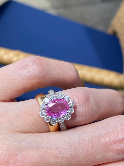 2.02 Carat Oval Cut Pink Sapphire and 0.90 CTW Natural Diamond Halo Ring in Platinum