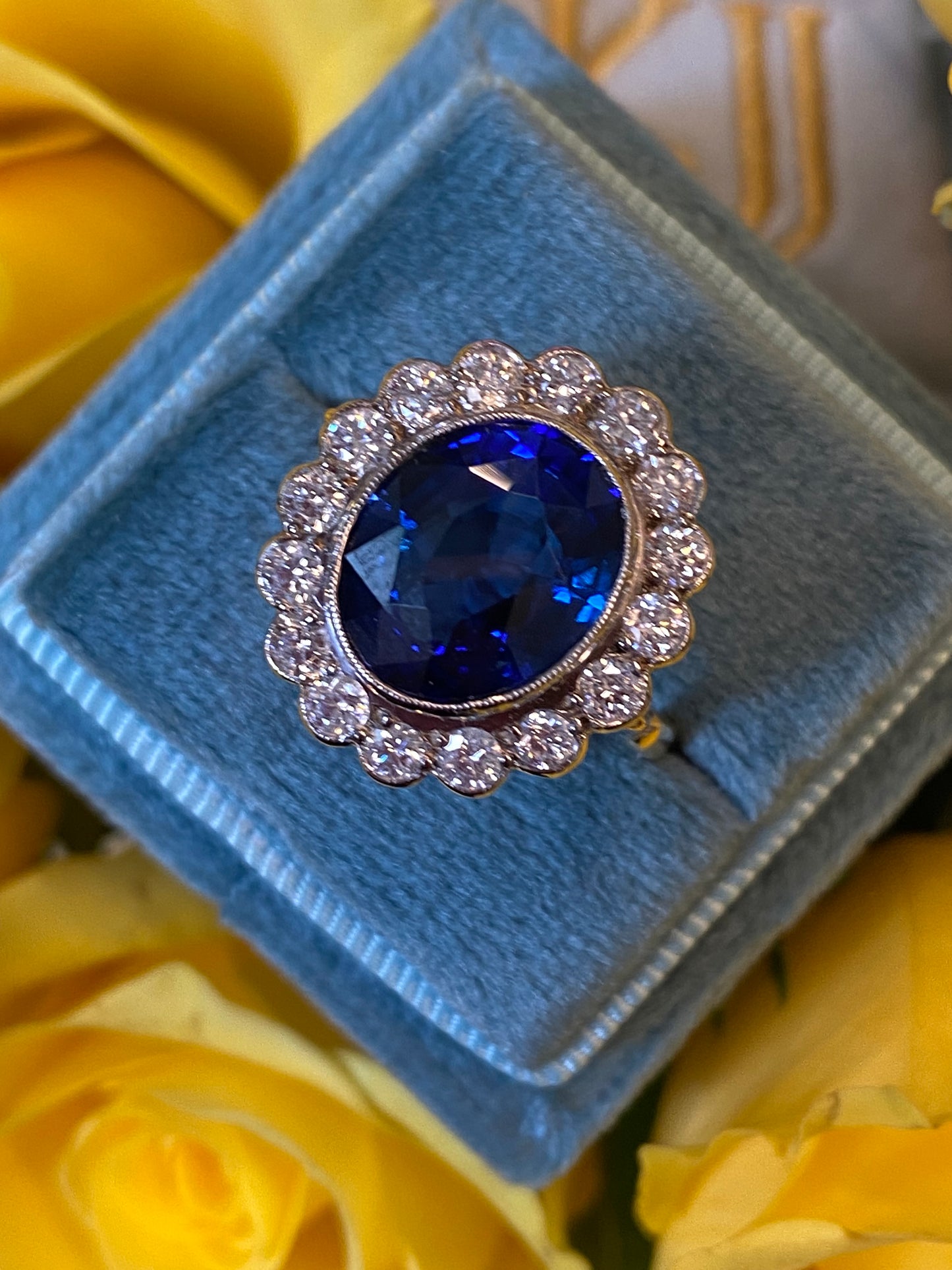 5.35 Carat Blue Ceylon Sapphire and Diamond Halo Ring in 18ct Gold