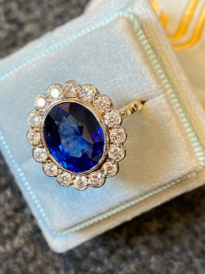 5.35 Carat Blue Ceylon Sapphire and Diamond Halo Ring in 18ct Gold