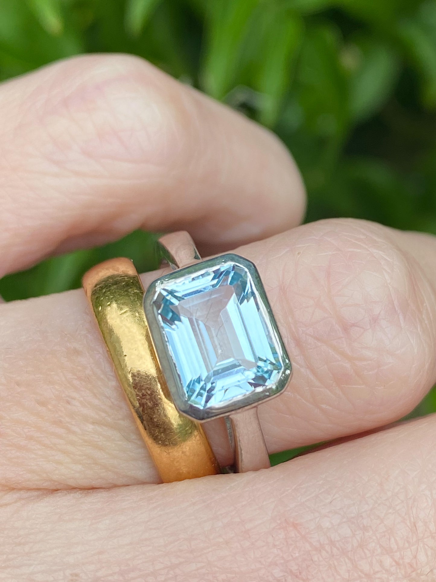 3.00 Carat Emerald Cut Blue Topaz East West Solitaire Ring in Sterling Silver