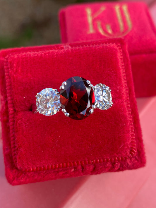 2.57 Carat Garnet and 1.84 Carat Moissanite Three Stone Ring