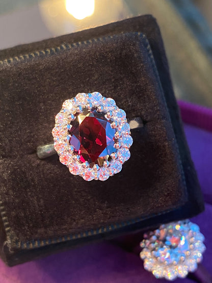 2.33 CTW Oval Cut Garnet and Moissanite Halo Cocktail Ring