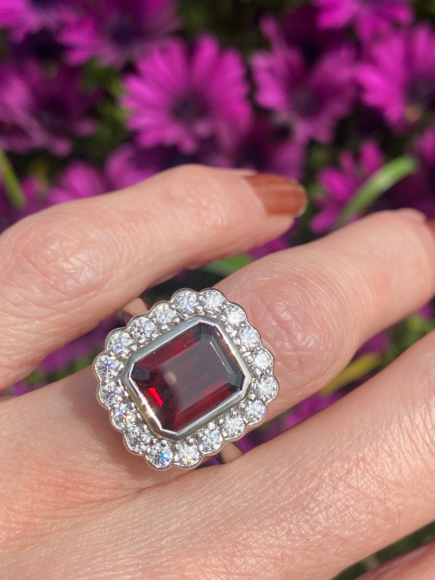 4.25 CTW Emerald Cut Garnet and Moissanite Halo Cocktail Ring in Sterling Silver