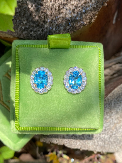 4.71 CTW Oval Cut Blue Topaz and Moissanite Earrings in Sterling Silver