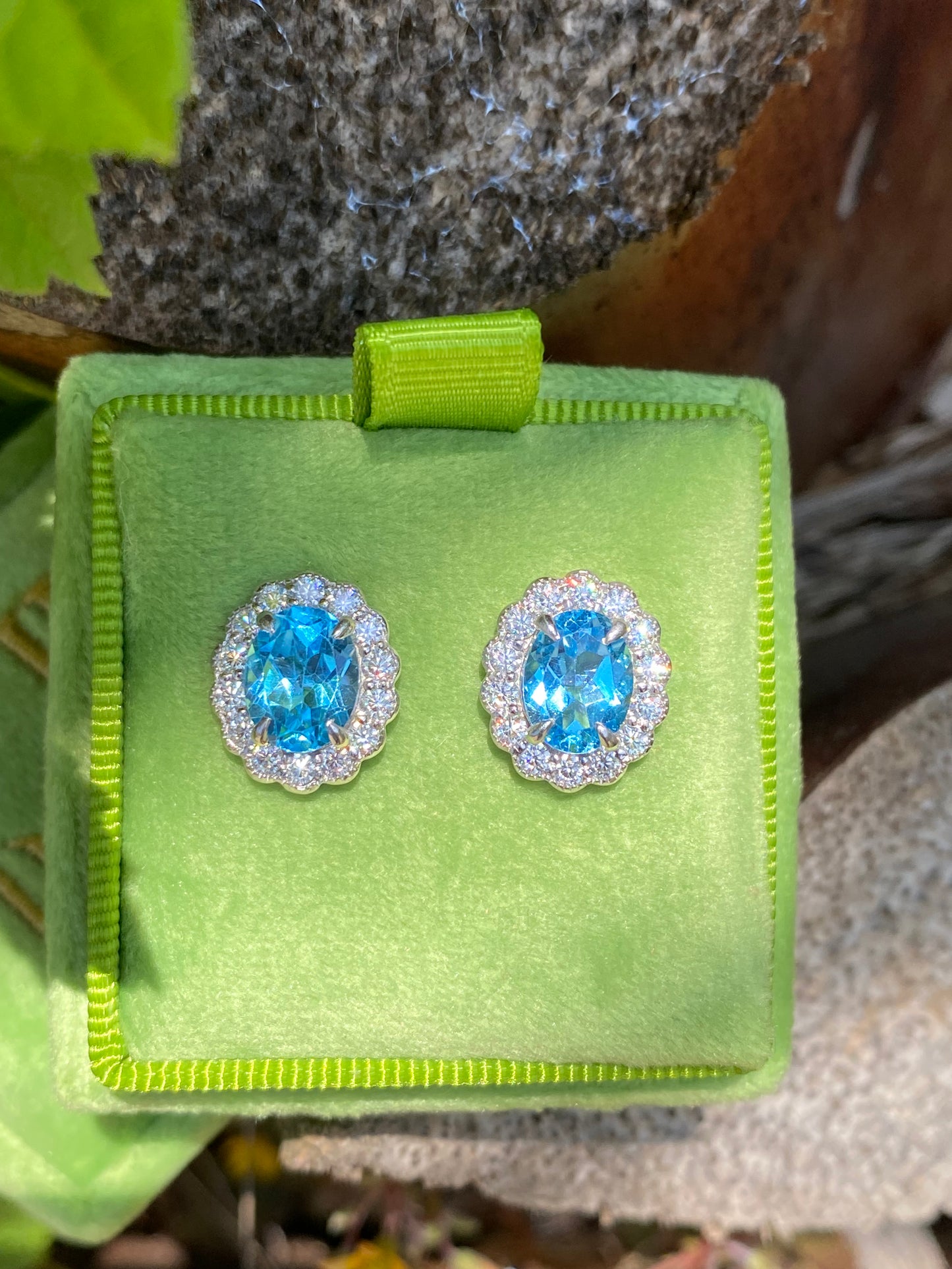 4.71 CTW Oval Cut Blue Topaz and Moissanite Earrings in Sterling Silver