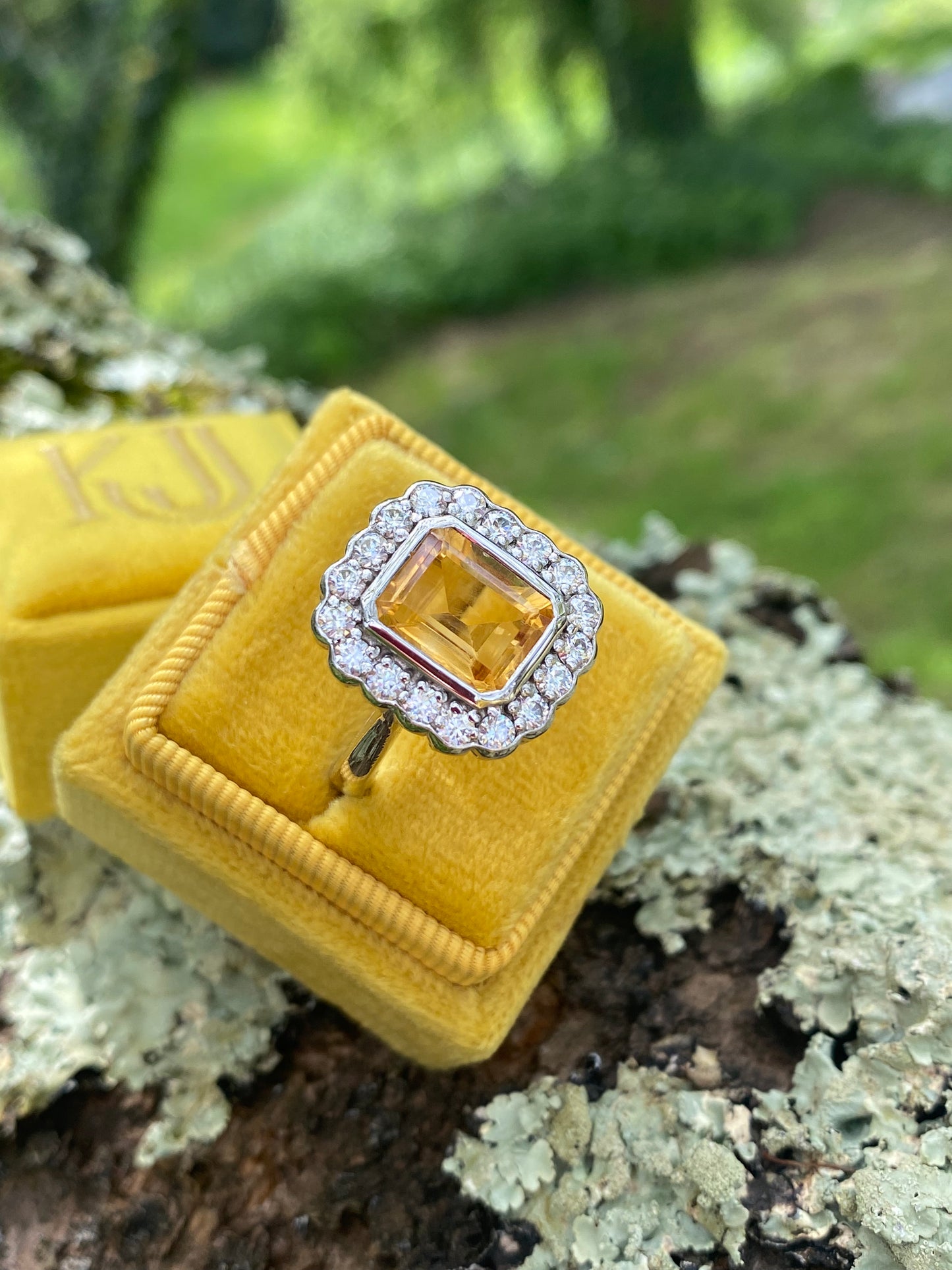 4.25 CTW Emerald Cut Citrine and Moissanite Halo Cocktail Ring