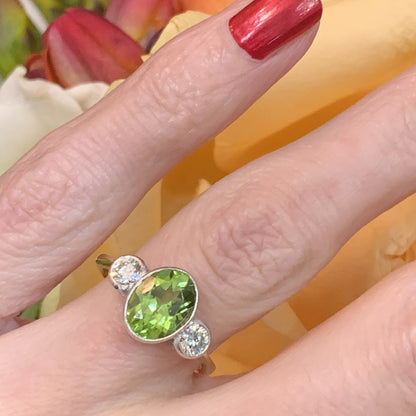 1.85 Carat Peridot and Diamond Three Stone Ring in 18K Gold