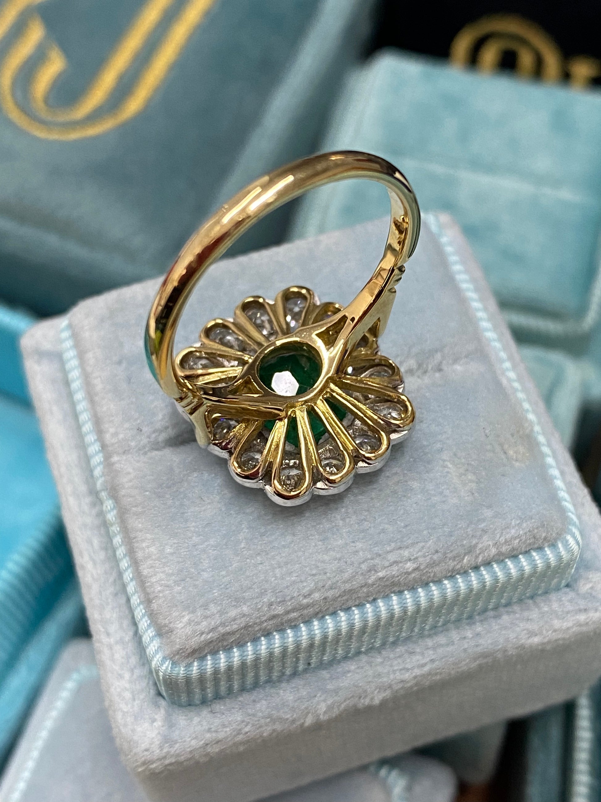 Emerald and Diamond Halo Antique Style engagement ring 