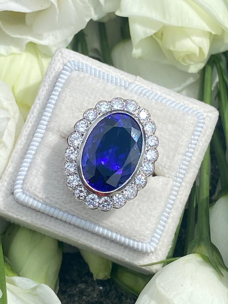 10 Carat Oval Tanzanite and Diamond Halo Cocktail Ring in Platinum