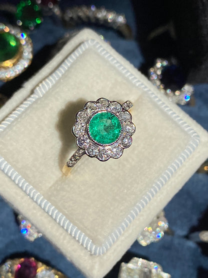 1.10 CTW Round Cut Emerald and Diamond Halo Engagement Ring in 18ct Gold