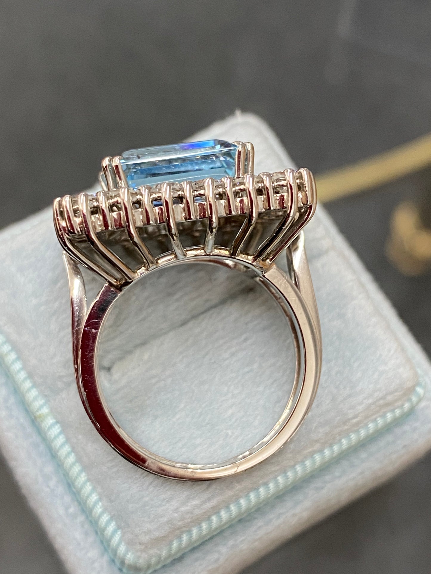 Emerald cut East West Aquamarine and Diamond Halo Cocktail Ring in Platinum 