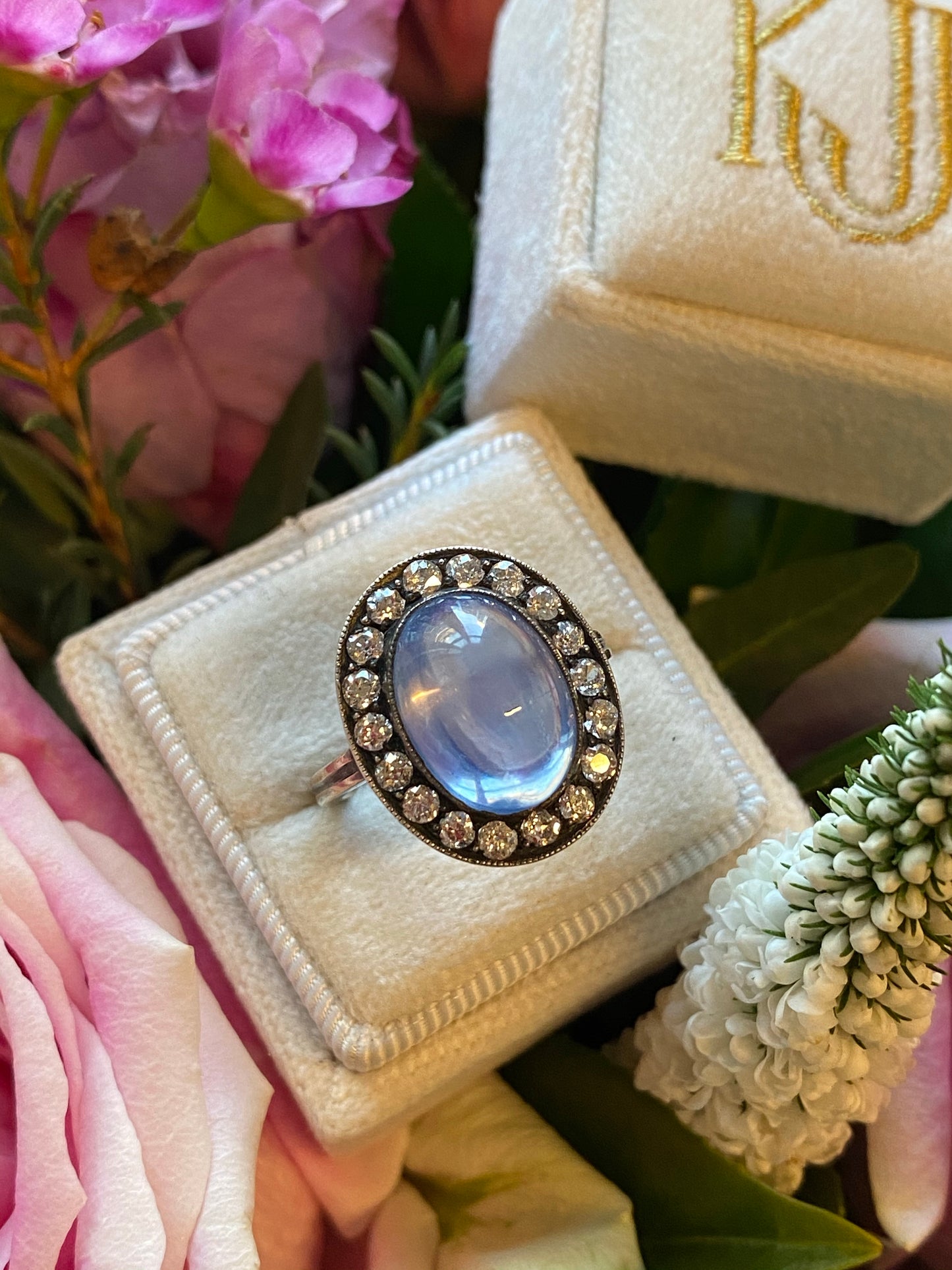 Antique No Heat Cabochon Blue Sapphire and Diamond Halo Ring 