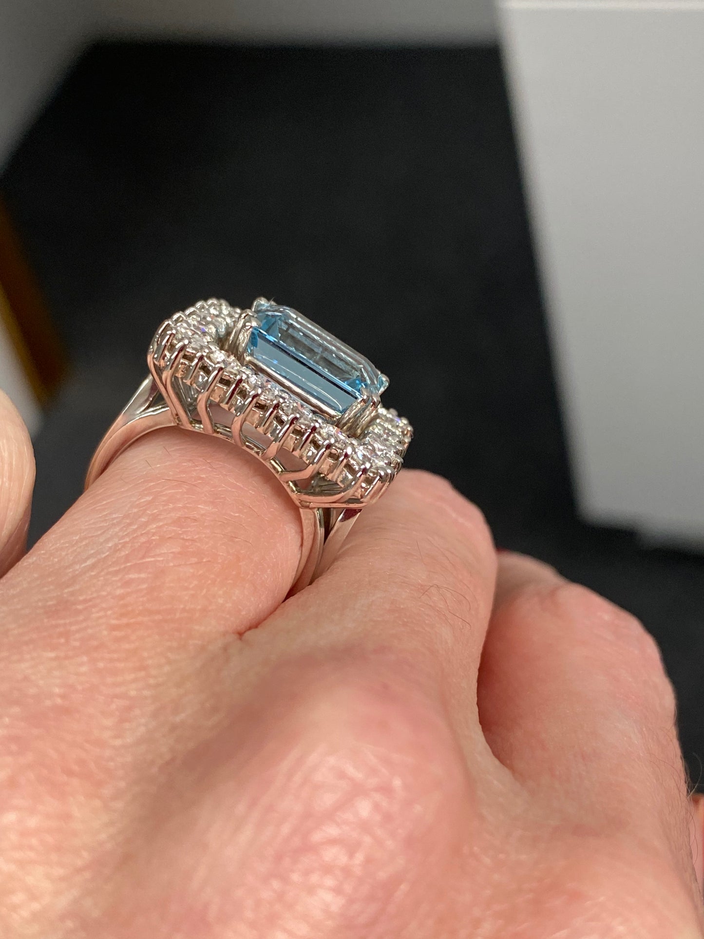 Emerald cut East West Aquamarine and Diamond Halo Cocktail Ring in Platinum 