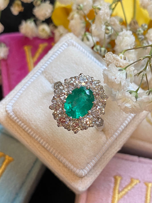 1.54 Carat Oval Cut Emerald and Diamond Halo Engagement Ring in Platinum 