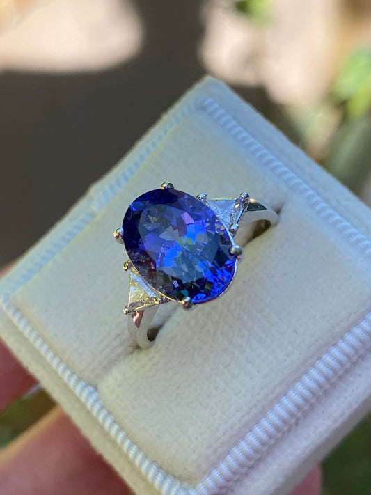 3.40 Carat Oval Tanzanite and Diamond Three Stone Engagement Ring