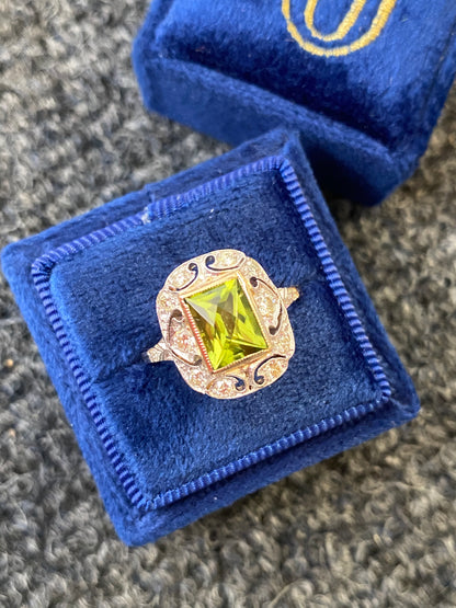 1.60 Carat Peridot and Diamond Art Deco Halo Ring in Platinum and 18ct Gold