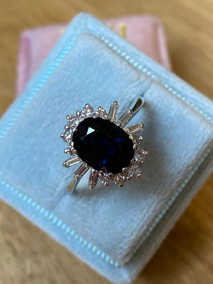 Vintage 2.50 Carat Oval Blue Sapphire and Diamond Halo Engagement Ring in White Gold