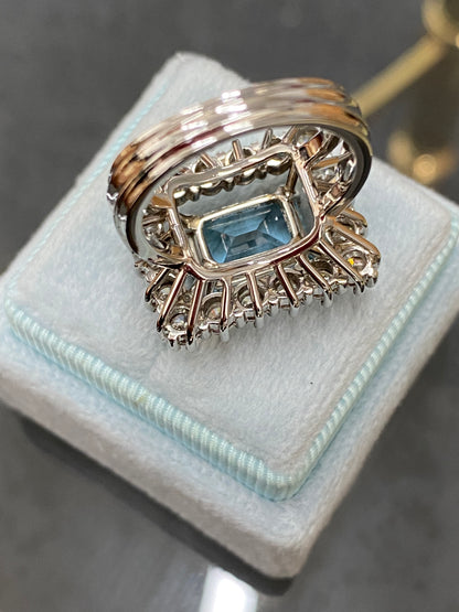 6.44 CTW East West Emerald Cut Aquamarine and Diamond Halo Cocktail Ring in Platinum